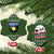 Guadeloupe Christmas Ceramic Ornament with Green-Red Plaid Design, Sun and Sugarcane Emblem, and Santa Sleigh Motif - Wonder Print Shop