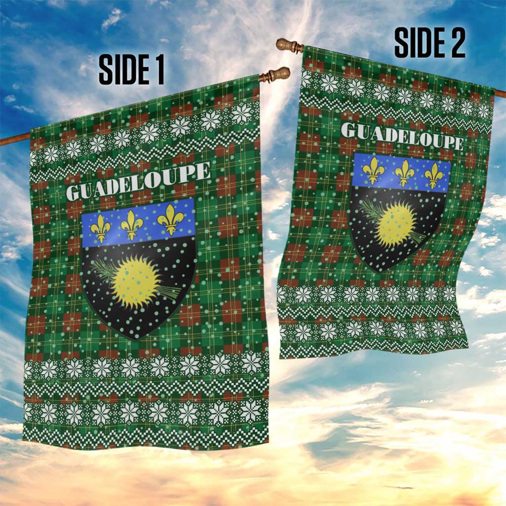Guadeloupe Christmas Garden Flag with Green-Red Plaid Design, Sun and Sugarcane Emblem, and Santa Sleigh Motif - Wonder Print Shop