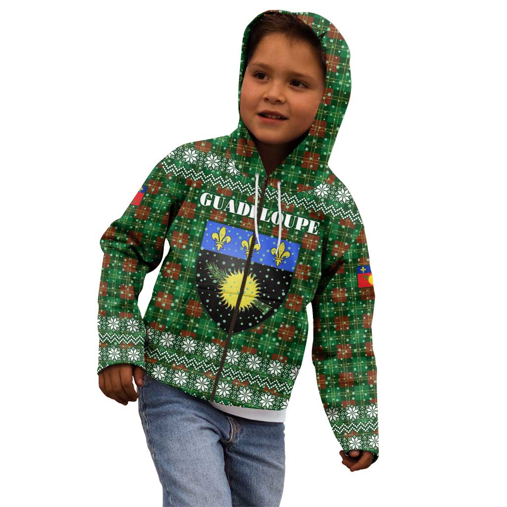 Guadeloupe Christmas Kid Hoodie with Green-Red Plaid Design, Sun and Sugarcane Emblem, and Santa Sleigh Motif - Wonder Print Shop