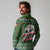 Guadeloupe Christmas Long Sleeve Polo Shirt with Green-Red Plaid Design, Sun and Sugarcane Emblem, and Santa Sleigh Motif - Wonder Print Shop