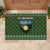 Guadeloupe Christmas Rubber Doormat with Green-Red Plaid Design, Sun and Sugarcane Emblem, and Santa Sleigh Motif - Wonder Print Shop