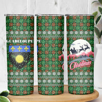Guadeloupe Christmas Skinny Tumbler with Green-Red Plaid Design, Sun and Sugarcane Emblem, and Santa Sleigh Motif - Wonder Print Shop