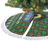 Guadeloupe Christmas Tree Skirt with Green-Red Plaid Design, Sun and Sugarcane Emblem, and Santa Sleigh Motif - Wonder Print Shop