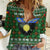 Guadeloupe Christmas Women Casual Shirt with Green-Red Plaid Design, Sun and Sugarcane Emblem, and Santa Sleigh Motif - Wonder Print Shop