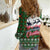 Guadeloupe Christmas Women Casual Shirt with Green-Red Plaid Design, Sun and Sugarcane Emblem, and Santa Sleigh Motif - Wonder Print Shop