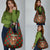 Guadeloupe Christmas Grocery Bag with Green-Red Plaid Design, Island Map, and Traditional Santa Motif - Wonder Print Shop