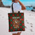Guadeloupe Christmas Tote Bag with Green-Red Plaid Design, Island Map, and Traditional Santa Motif - Wonder Print Shop