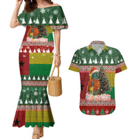 Guinea Bissau Christmas Couples Matching Mermaid Dress and Hawaiian Shirt with Santa Penguin Christmas Tree and Red Green Yellow Snowflake - Wonder Print Shop