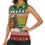 Guinea Bissau Christmas Women Sleeveless Polo Shirt with Santa Penguin Christmas Tree and Red Green Yellow Snowflake - Wonder Print Shop
