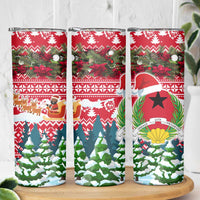 Guinea Bissau Christmas Skinny Tumbler with Santa Sleigh Reindeer Forest and National Flag Design - Wonder Print Shop