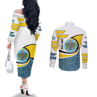 Saint Lucia Modern Tribal Crest Design Couples Matching Off The Shoulder Long Sleeve Dress and Long Sleeve Button Shirt with Flag Colors and Bold Text Layout - Wonder Print Shop
