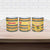 Chad Christmas Ceramic Mug with Yellow-Blue Geometric Design, National Coat of Arms, and Festive Motif - Wonder Print Shop