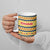 Chad Christmas Ceramic Mug with Yellow-Blue Geometric Design, National Coat of Arms, and Festive Motif - Wonder Print Shop
