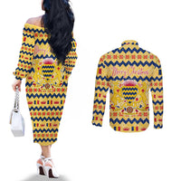Chad Christmas Couples Matching Off The Shoulder Long Sleeve Dress and Long Sleeve Button Shirt with Yellow-Blue Geometric Design, National Coat of Arms, and Festive Motif - Wonder Print Shop