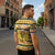 Chad Christmas Zipper Polo Shirt with Yellow-Blue Geometric Design, National Coat of Arms, and Festive Motif - Wonder Print Shop