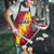 Chad Christmas Apron with Red-Yellow Festive Pattern, National Coat of Arms, and Snowflake Accents - Wonder Print Shop