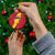 Chad Christmas Ceramic Ornament with Red-Yellow Festive Pattern, National Coat of Arms, and Snowflake Accents - Wonder Print Shop
