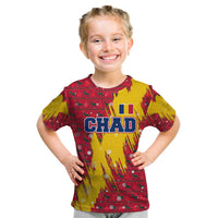 Chad Christmas Kid T Shirt with Red-Yellow Festive Pattern, National Coat of Arms, and Snowflake Accents - Wonder Print Shop