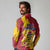 Chad Christmas Long Sleeve Polo Shirt with Red-Yellow Festive Pattern, National Coat of Arms, and Snowflake Accents - Wonder Print Shop