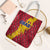 Chad Christmas Tote Bag with Red-Yellow Festive Pattern, National Coat of Arms, and Snowflake Accents - Wonder Print Shop