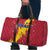 Chad Christmas Travel Bag with Red-Yellow Festive Pattern, National Coat of Arms, and Snowflake Accents - Wonder Print Shop