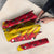 Chad Christmas Umbrella with Red-Yellow Festive Pattern, National Coat of Arms, and Snowflake Accents - Wonder Print Shop