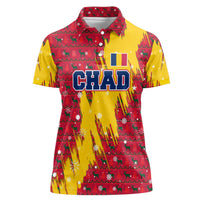 Chad Christmas Women Polo Shirt with Red-Yellow Festive Pattern, National Coat of Arms, and Snowflake Accents - Wonder Print Shop