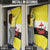 Brunei Christmas Door Cover with Cartoon Monkey Santa Hat Candy Cane and Yellow Black Flag Pattern - Wonder Print Shop