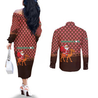 Morocco Christmas Couples Matching Off The Shoulder Long Sleeve Dress and Long Sleeve Button Shirt with Santa Claus Camel Caravan Desert Scene and Red Pattern Design - Wonder Print Shop