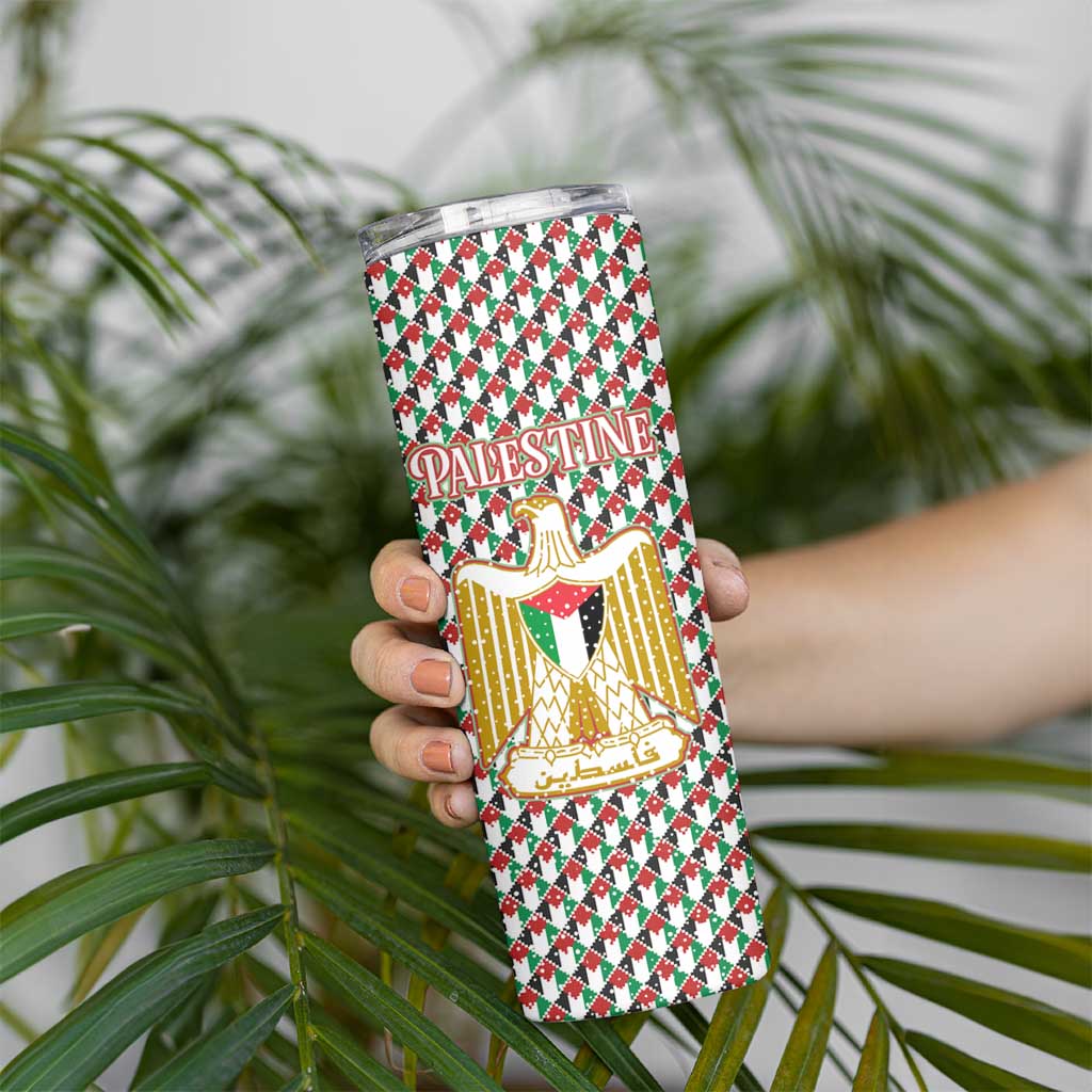 Palestine Christmas Skinny Tumbler with Red-Green Pattern, Golden Eagle Emblem, and Jesus Holding Flag Motif - Wonder Print Shop