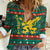 Bulgaria Christmas Women Casual Shirt with Green-Red Theme, Golden Lion, and Santa Sleigh Motif - Wonder Print Shop