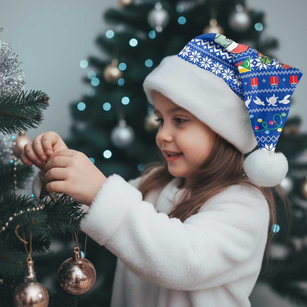 Comoros Christmas Santa Hat with Santa Turtle Gifts Snowflakes and Ocean Blue Holiday Pattern - Wonder Print Shop