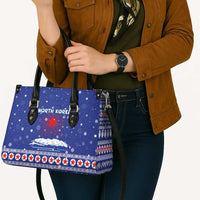 North Korea Christmas Leather Bag with Blue Pattern, Red Star, and Snowy Mountain Motif - Wonder Print Shop
