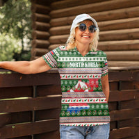 North Korea Christmas Women Polo Shirt with Green-Red Design, National Emblem, and Festive Snowflake Motif - Wonder Print Shop