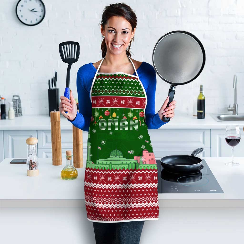 Oman Christmas Apron with Green-Red Pattern, Mosque and Fort Landmarks, and Festive Ornament Motif - Wonder Print Shop