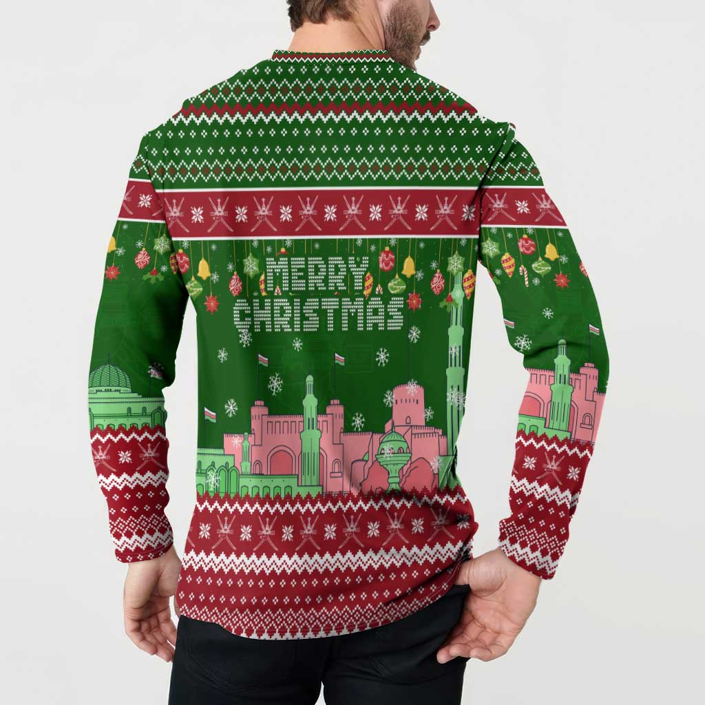 Oman Christmas Button Sweatshirt with Green-Red Pattern, Mosque and Fort Landmarks, and Festive Ornament Motif - Wonder Print Shop