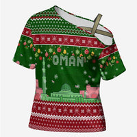 Oman Christmas Cross Shoulder Shirt with Green-Red Pattern, Mosque and Fort Landmarks, and Festive Ornament Motif - Wonder Print Shop