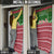 Oman Christmas Door Cover with Green-Red Pattern, Mosque and Fort Landmarks, and Festive Ornament Motif - Wonder Print Shop