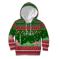 Oman Christmas Kid Hoodie with Green-Red Pattern, Mosque and Fort Landmarks, and Festive Ornament Motif - Wonder Print Shop
