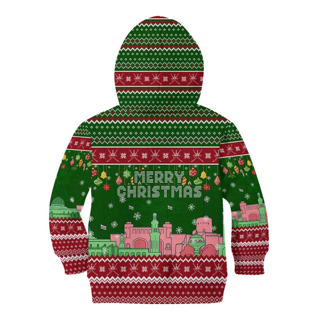 Oman Christmas Kid Hoodie with Green-Red Pattern, Mosque and Fort Landmarks, and Festive Ornament Motif - Wonder Print Shop