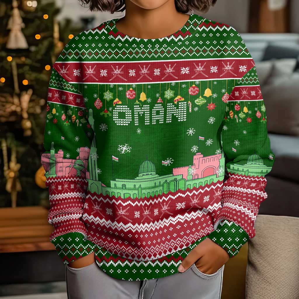 Oman Christmas Kid Ugly Christmas Sweater with Green-Red Pattern, Mosque and Fort Landmarks, and Festive Ornament Motif - Wonder Print Shop