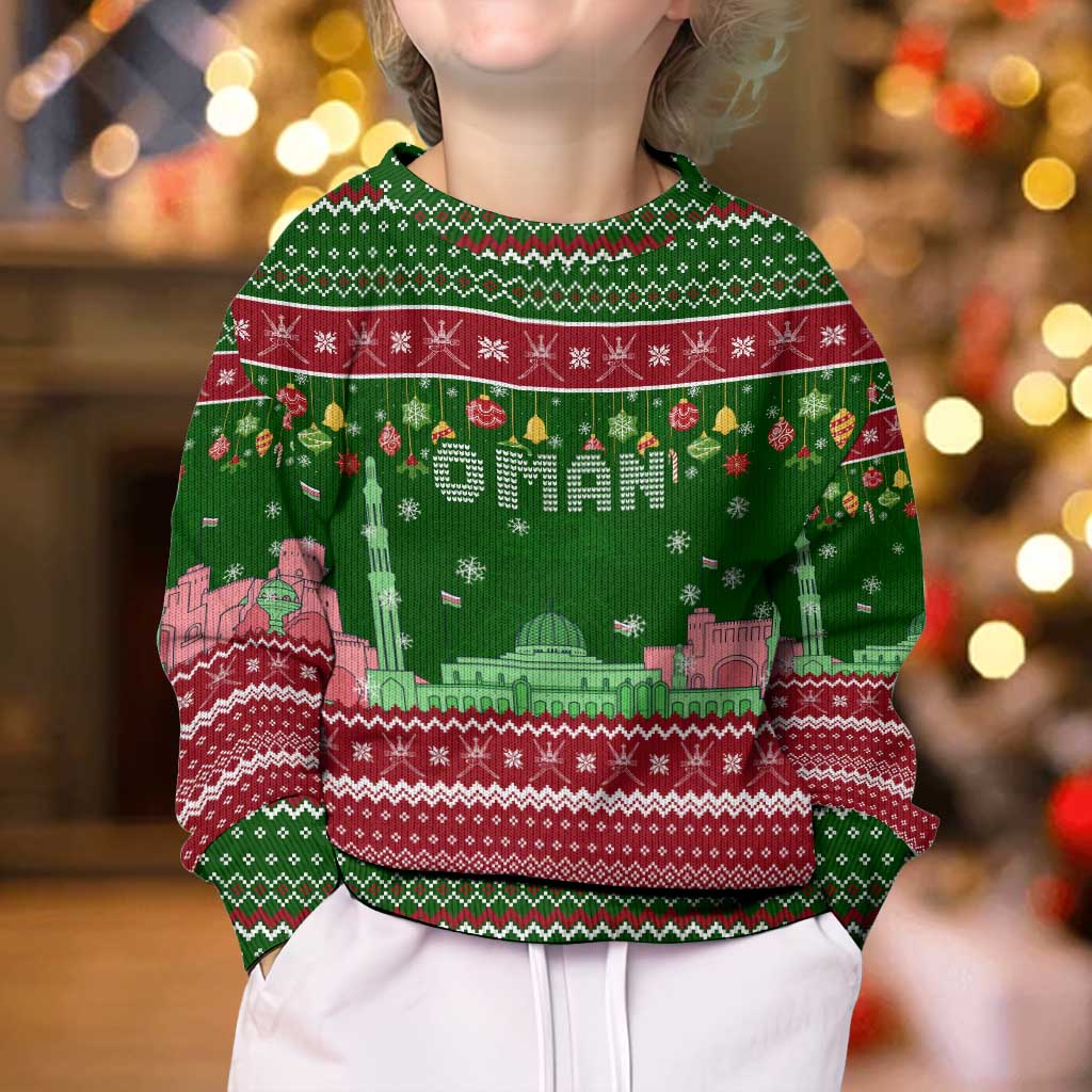 Oman Christmas Kid Ugly Christmas Sweater with Green-Red Pattern, Mosque and Fort Landmarks, and Festive Ornament Motif - Wonder Print Shop