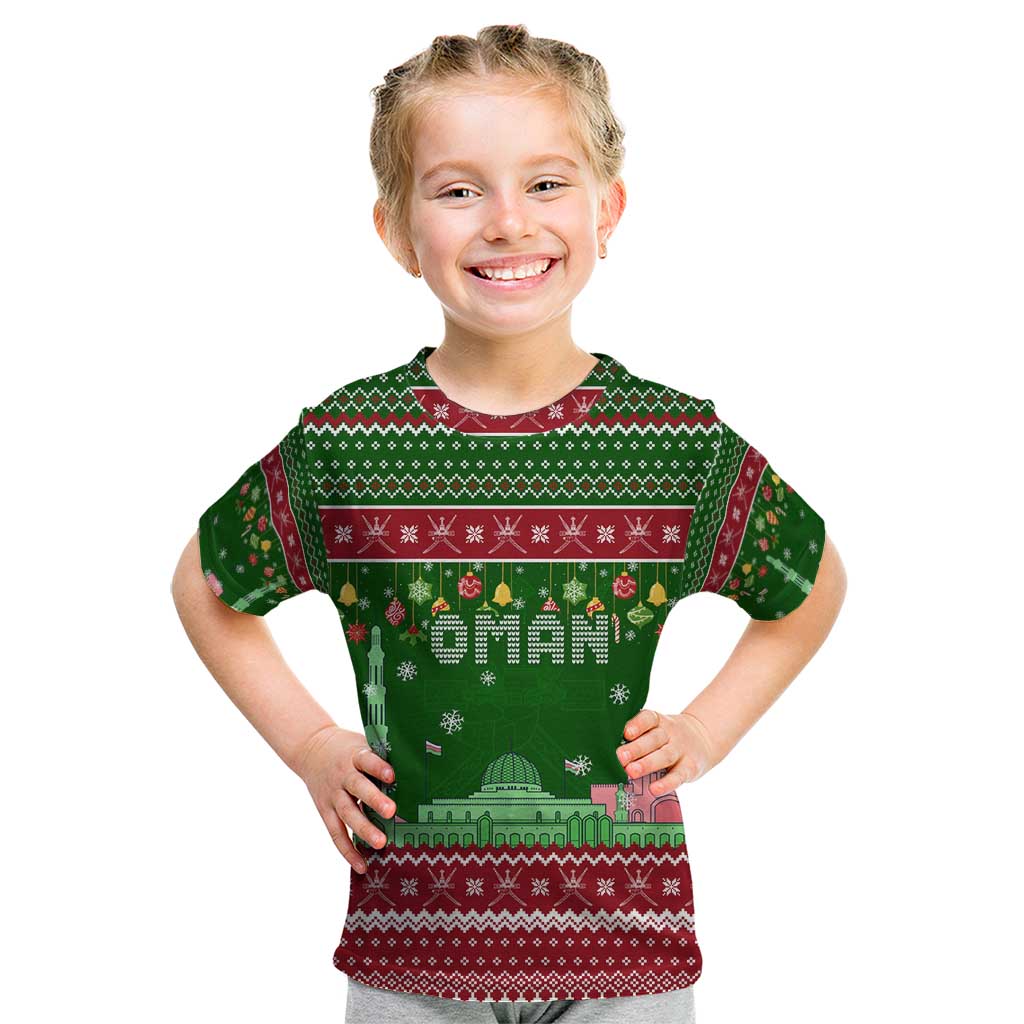 Oman Christmas Kid T Shirt with Green-Red Pattern, Mosque and Fort Landmarks, and Festive Ornament Motif - Wonder Print Shop