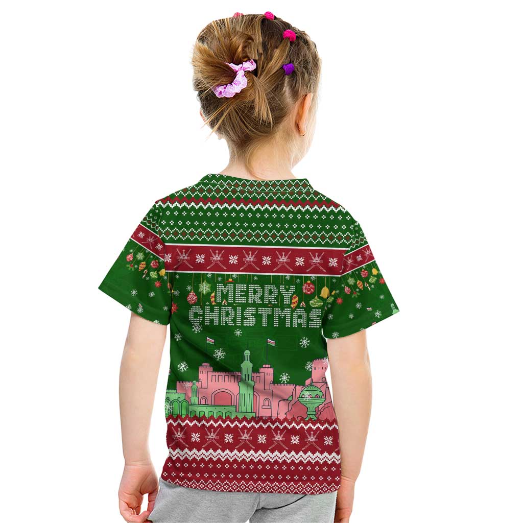 Oman Christmas Kid T Shirt with Green-Red Pattern, Mosque and Fort Landmarks, and Festive Ornament Motif - Wonder Print Shop