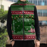 Oman Christmas Sleeveless Puffer Jacket with Green-Red Pattern, Mosque and Fort Landmarks, and Festive Ornament Motif - Wonder Print Shop