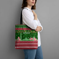 Oman Christmas Tote Bag with Green-Red Pattern, Mosque and Fort Landmarks, and Festive Ornament Motif - Wonder Print Shop