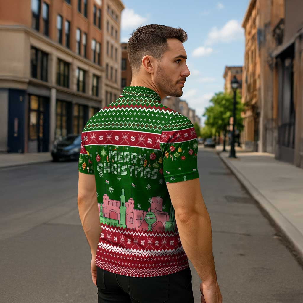 Oman Christmas Zipper Polo Shirt with Green-Red Pattern, Mosque and Fort Landmarks, and Festive Ornament Motif - Wonder Print Shop