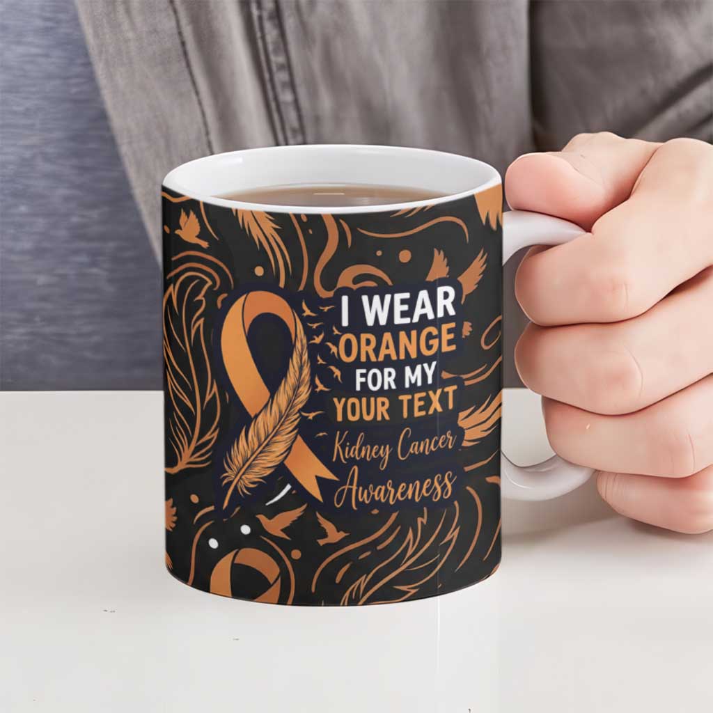 Personalized I Wear Orange Kidney Cancer Awareness Ceramic Mug Feathered Ribbon Silhouette Illustration
