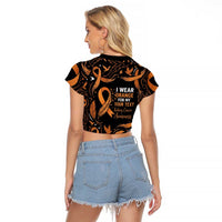 Personalized I Wear Orange Kidney Cancer Awareness Raglan Cropped T Shirt Feathered Ribbon Silhouette Illustration