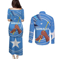 Somalia Couples Matching Puletasi and Long Sleeve Button Shirt with Raised Fist Flag Blue Unity Wave Spirit